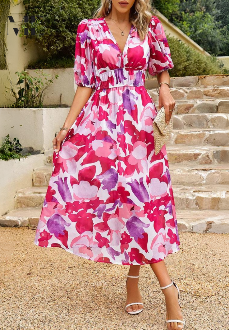 Pink - Women's flowing midi dress featuring a V-neckline, half puff sleeves, and a large-scale abstract floral print in muted earthy tones, styled with a woven clutch.