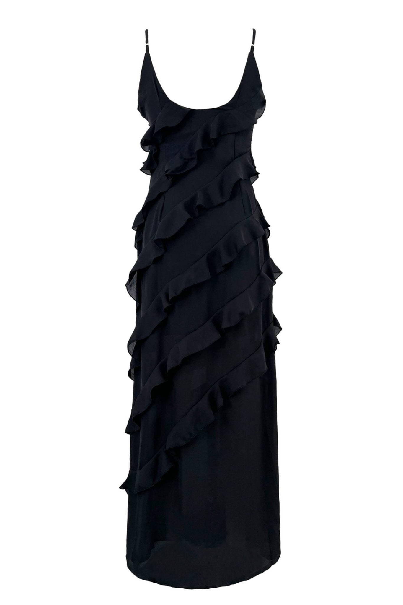 Black - A woman wearing a vibrant red chiffon maxi dress with cascading diagonal ruffles, a V-neckline, and thin spaghetti straps, posing against a rustic dark wooden door.