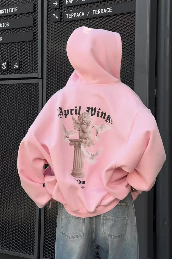 White - Back view of a woman wearing a dark grey oversized hoodie featuring a large graphic print of an angel statue and white doves, paired with a dark grey pleated mini skirt.