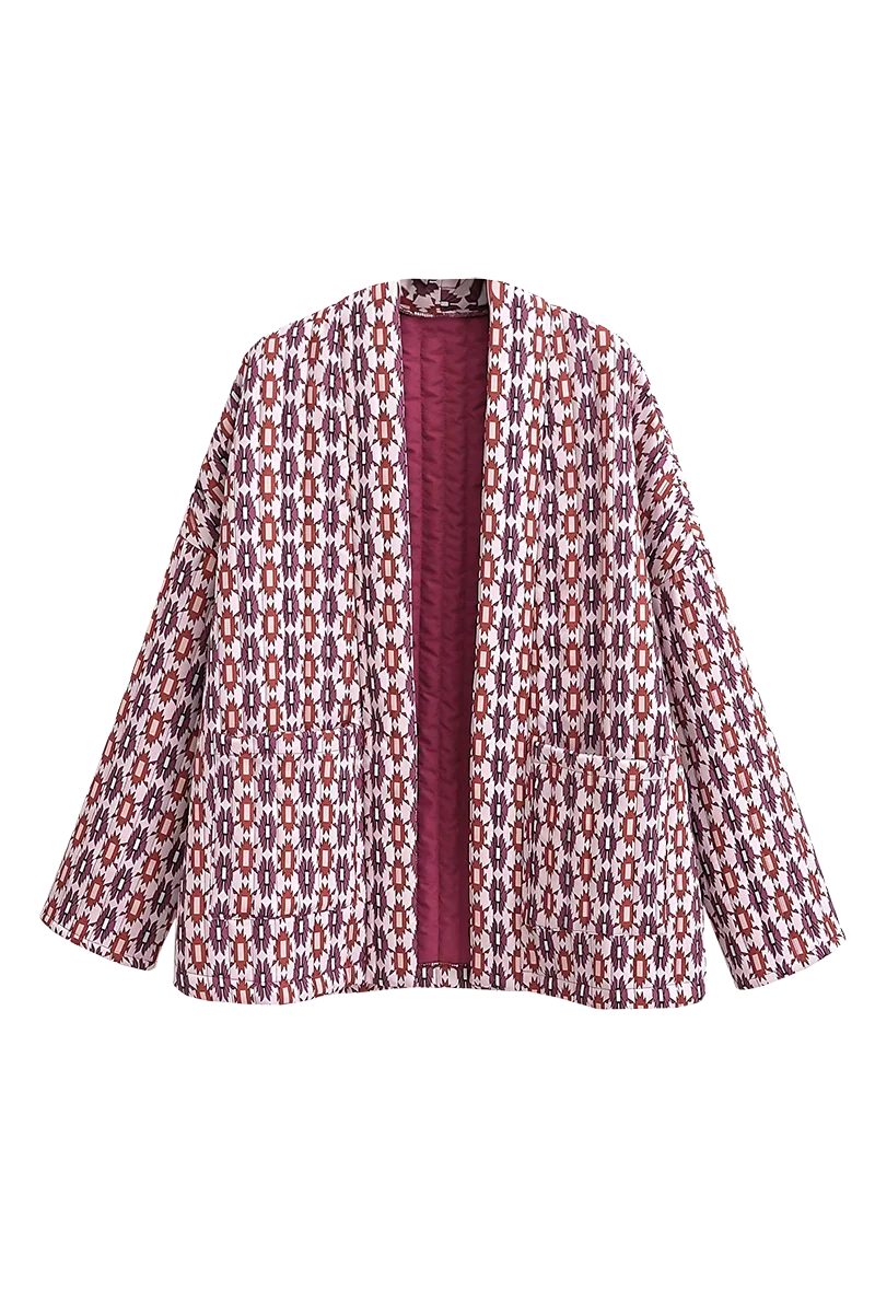 Red - Woman wearing a pink and red geometric print quilted open-front jacket with rolled cuffs, styled with light wash jeans and a white tee.