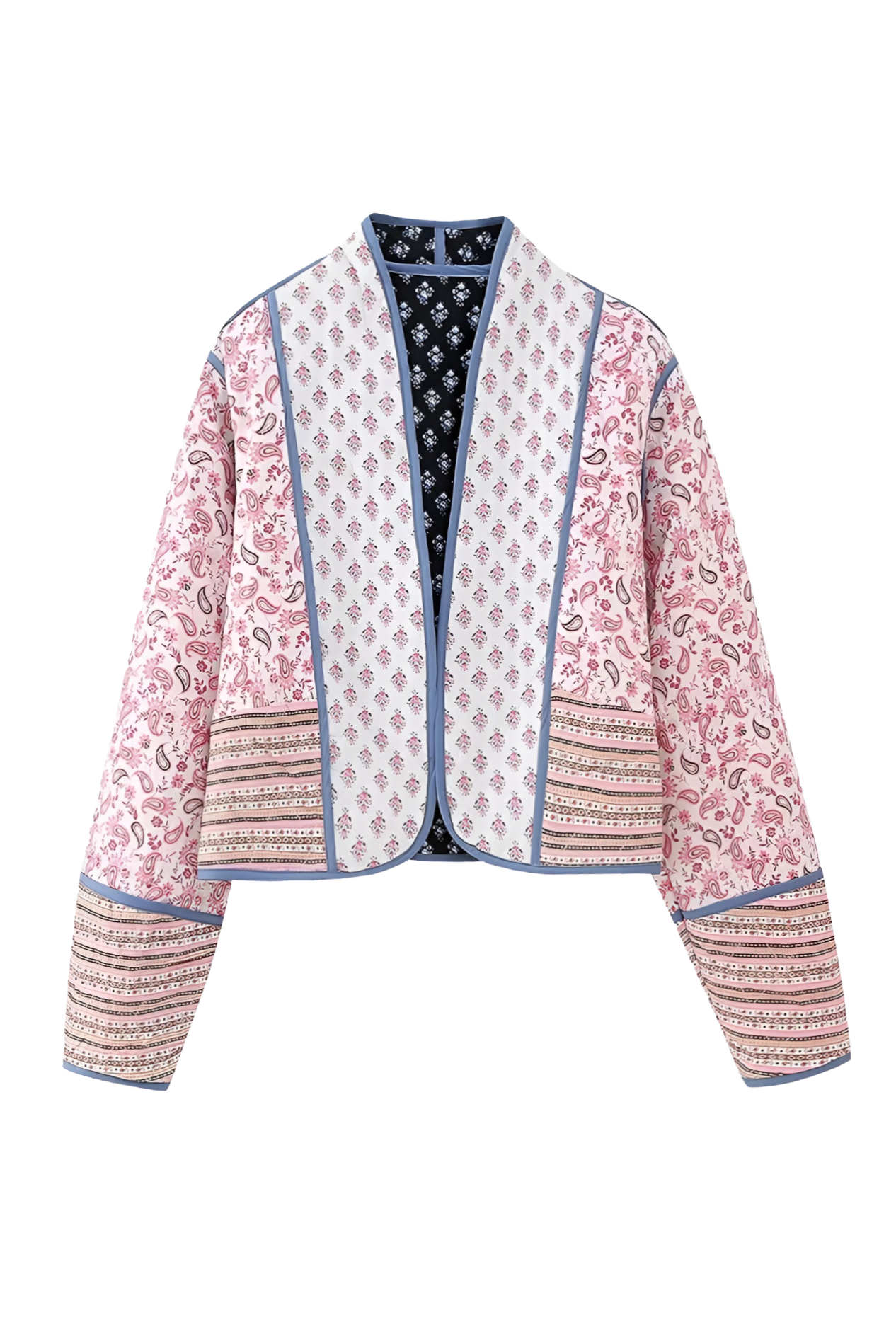 Pink - Women's open-front quilted jacket featuring a pink and white floral block print, contrasting blue edge binding, and diamond stitching, worn over a white tee and light wash jeans.