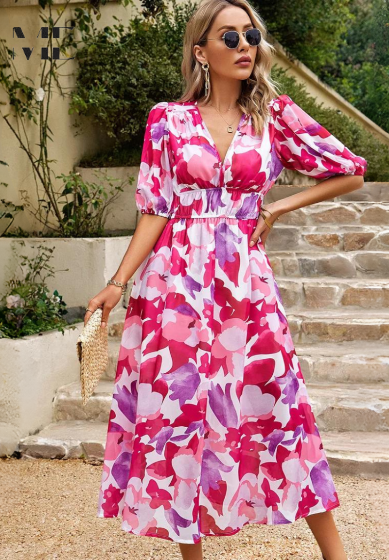 Pink - Women's flowing midi dress featuring a V-neckline, half puff sleeves, and a large-scale abstract floral print in muted earthy tones, styled with a woven clutch.