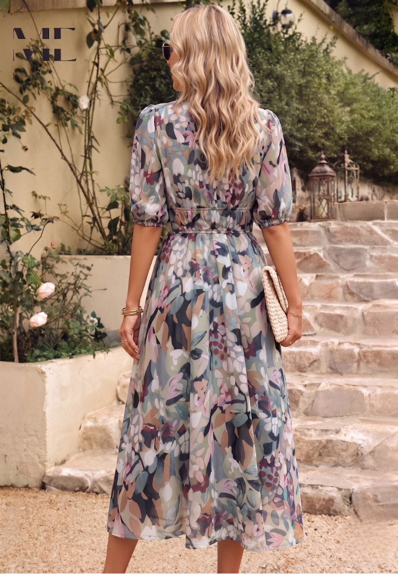 Floral - Women's flowing midi dress featuring a V-neckline, half puff sleeves, and a large-scale abstract floral print in muted earthy tones, styled with a woven clutch.