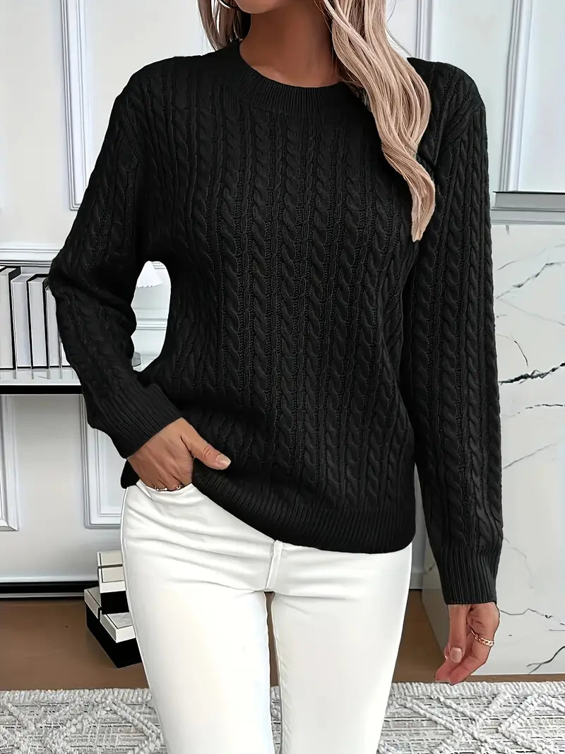 Black - Women's light pink cable knit sweater with long sleeves and a crew neckline, worn with white pants.