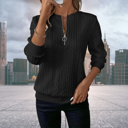 Black - Women's white long-sleeve pullover sweater featuring an all-over cable knit texture, a half-zip front with a silver ring pull, and ribbed cuffs and hem.