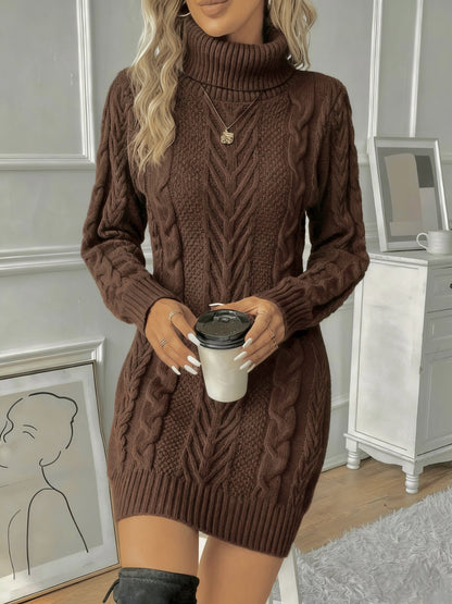 Brown - Woman wearing a heavyweight cable knit long sleeve mini dress with a high roll neck and ribbed hem.