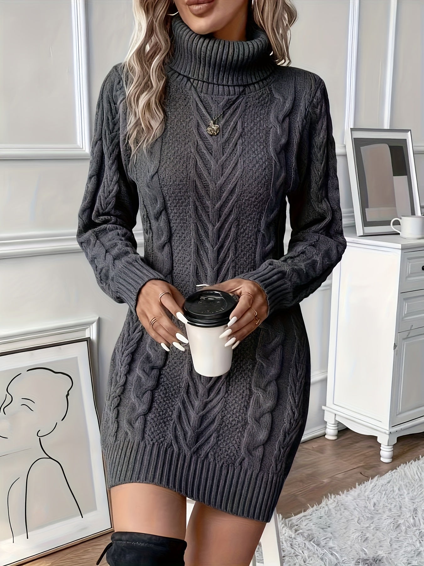 Grey - Woman wearing a heavyweight cable knit long sleeve mini dress with a high roll neck and ribbed hem.