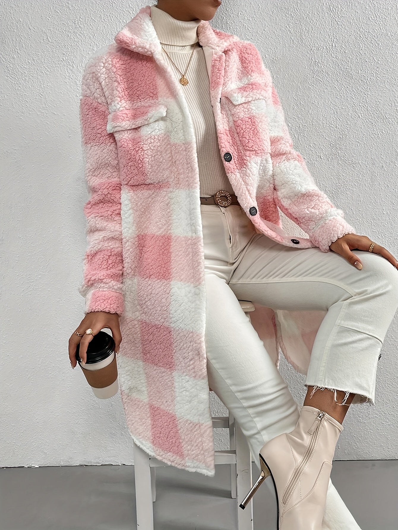Pink - Women's longline teddy coat featuring a large pink and white check pattern, collared neckline, and button-front closure, styled over a ribbed knit top and white denim.