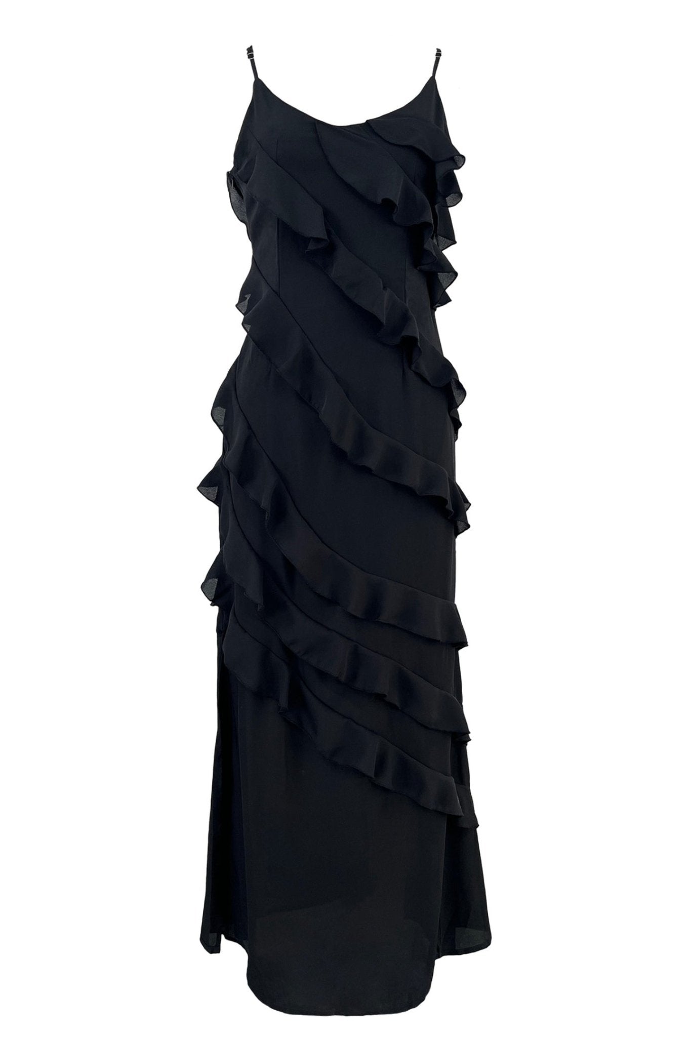 Black - A woman wearing a vibrant red chiffon maxi dress with cascading diagonal ruffles, a V-neckline, and thin spaghetti straps, posing against a rustic dark wooden door.