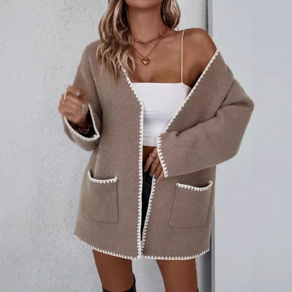 Camel - Women's mid-length, open-front knit cardigan featuring an oversized fit, drop shoulders, front patch pockets, and decorative contrast stitching along the edges.