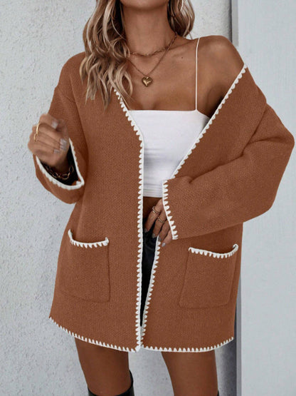 Black - Women's mid-length, open-front knit cardigan featuring an oversized fit, drop shoulders, front patch pockets, and decorative contrast stitching along the edges.