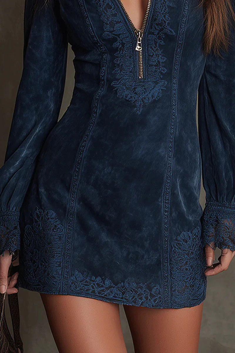 Green - Woman wearing a fitted suede-like long-sleeve mini dress featuring tonal embroidery, a zip-front V-neckline, and flared lace-trimmed cuffs.