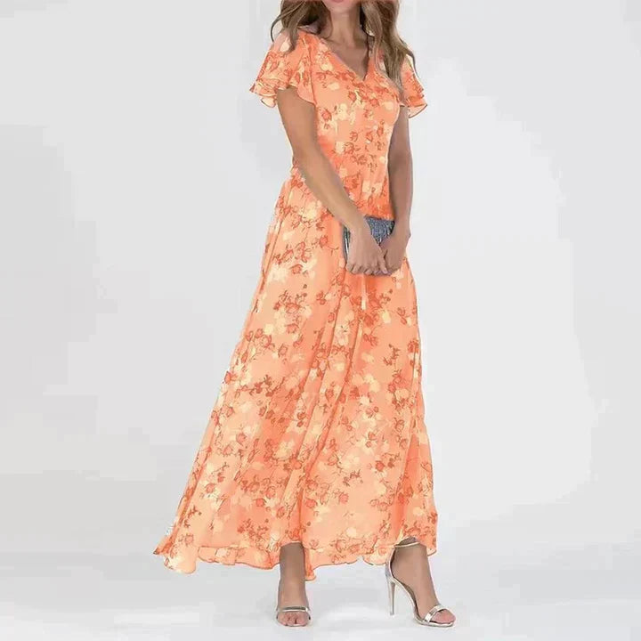 Orange - Women's light blue maxi dress featuring a white and grey floral print, V-neckline, short flutter sleeves, and a flowing sheer overlay skirt.