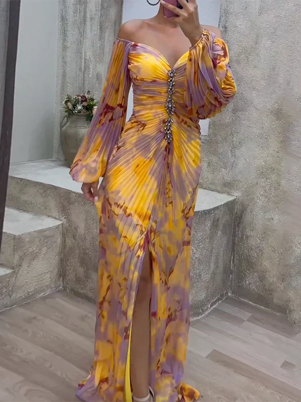 Multicoloured - Woman wearing a long sleeve, pleated floral maxi dress with a jewelled front trim and high slit