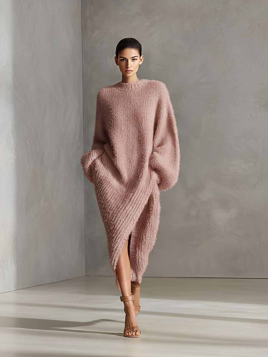 Pink - A woman wearing an oversized, cream-coloured fluffy knit midi dress with a high neckline, long voluminous sleeves, and an asymmetric draped wrap hemline.