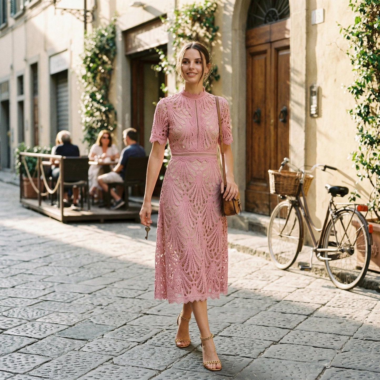 Light Blue - A woman wearing a black geometric lace midi dress with a high neck, short sleeves, and a defined waist, featuring a nude lining and scalloped hem.