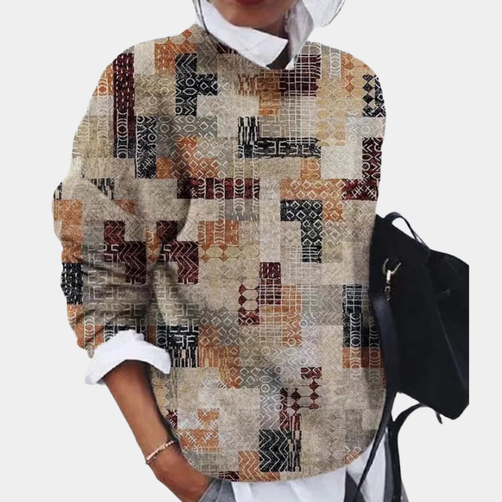 Khaki - Women's relaxed fit long sleeve top featuring an intricate geometric patchwork print, styled over a white collared shirt.