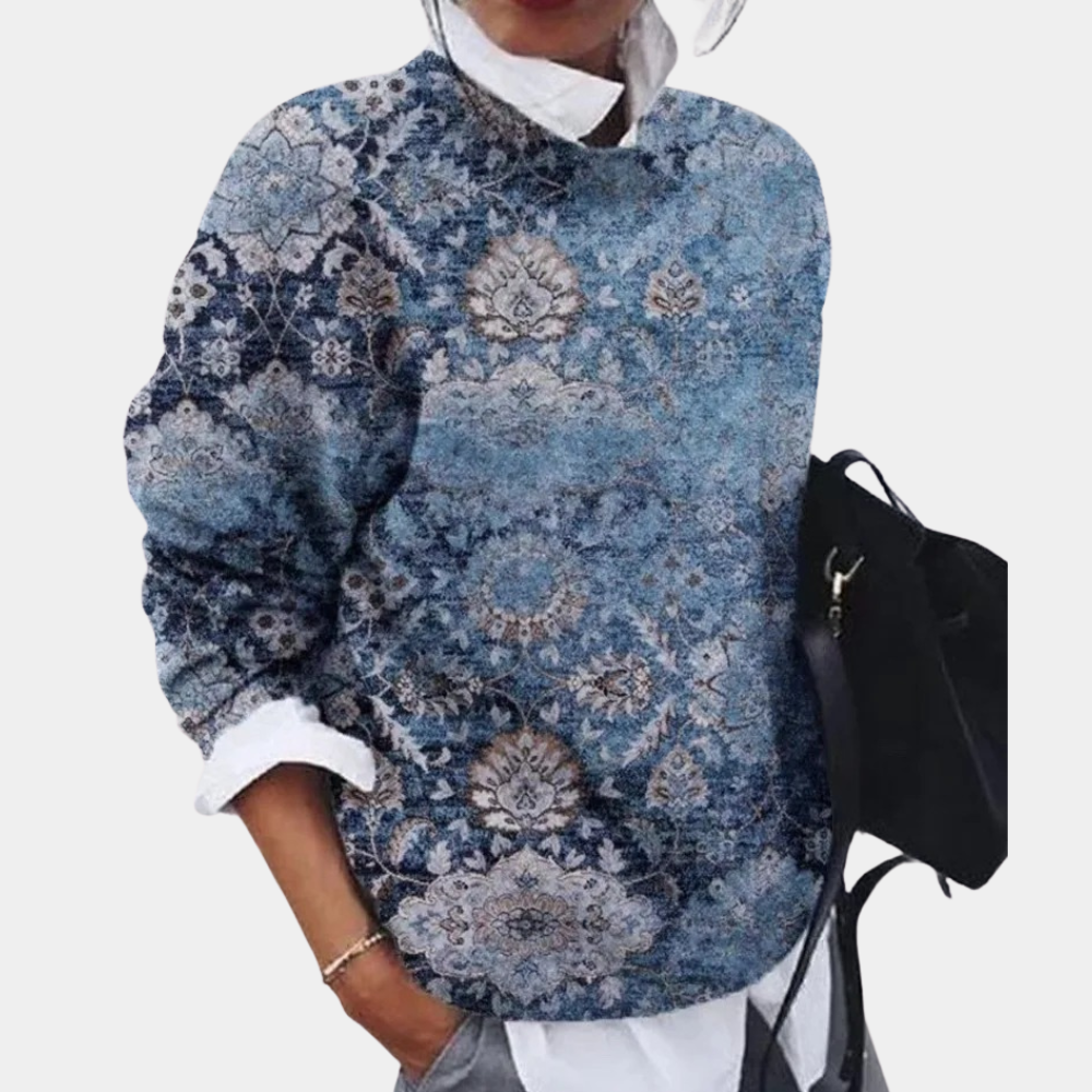 Blue - Women's relaxed fit long sleeve top featuring an intricate geometric patchwork print, styled over a white collared shirt.