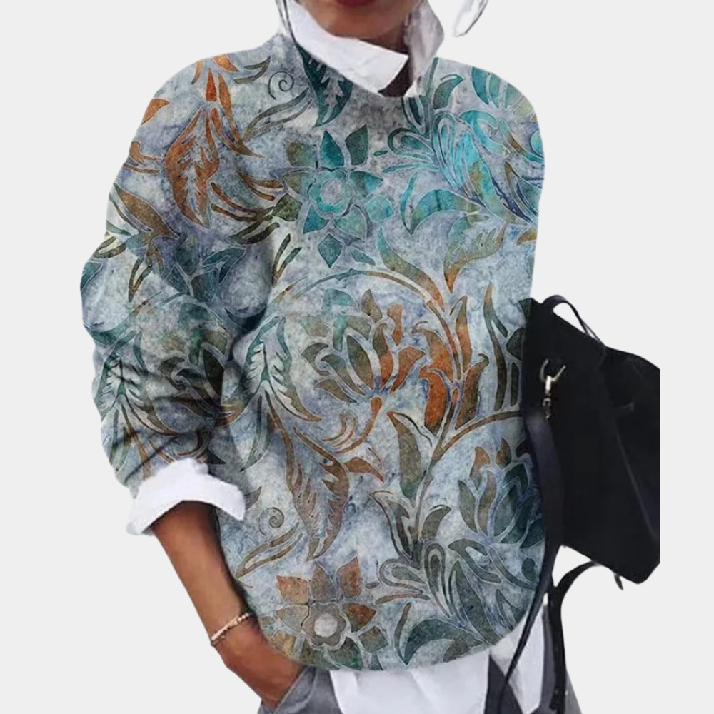 Sky Blue - Women's relaxed fit long sleeve top featuring an intricate geometric patchwork print, styled over a white collared shirt.
