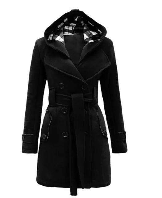Black - A woman wearing a cream-coloured, mid-length double-breasted trench coat with a hood, a tied waist belt, and black pants.