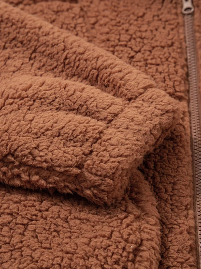 Brown - Women's brown hooded teddy fleece jacket with front zipper and patch pockets, worn over a white t-shirt and jeans.