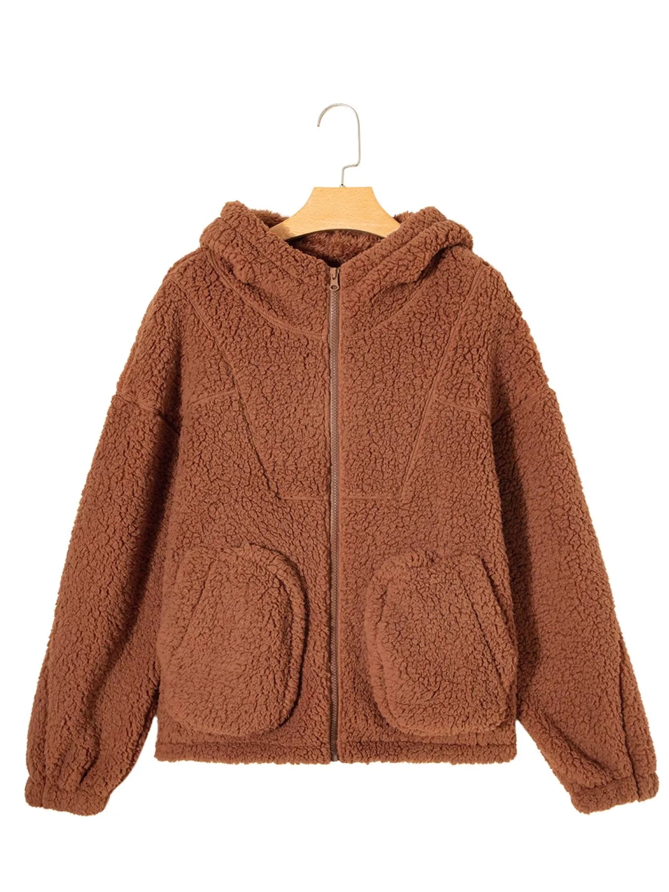 Brown - Women's brown hooded teddy fleece jacket with front zipper and patch pockets, worn over a white t-shirt and jeans.