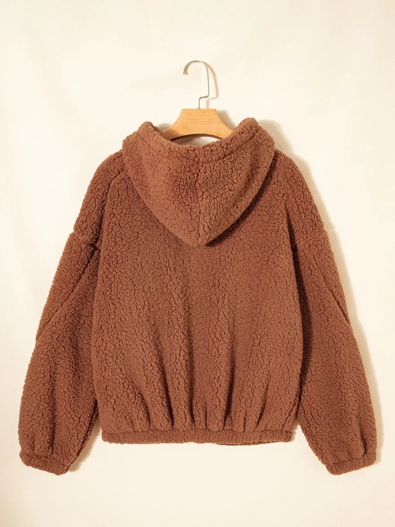 Brown - Women's brown hooded teddy fleece jacket with front zipper and patch pockets, worn over a white t-shirt and jeans.