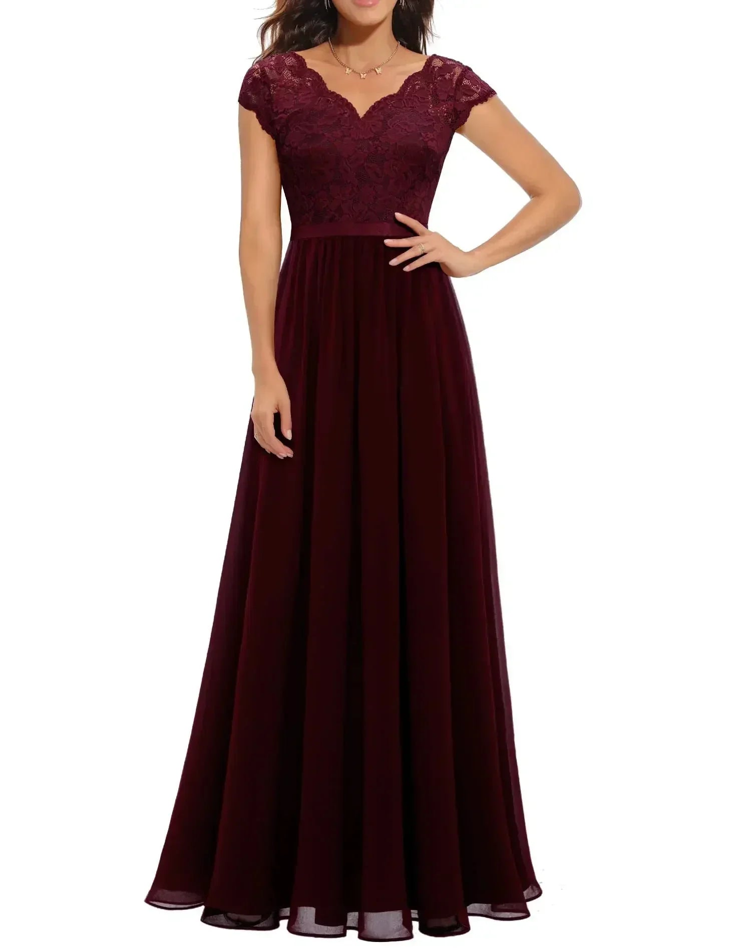 Burgundy Short Sleeve - Woman wearing a long A-line maxi dress featuring a lace bodice with 3/4 sleeves and a flowing pleated georgette skirt