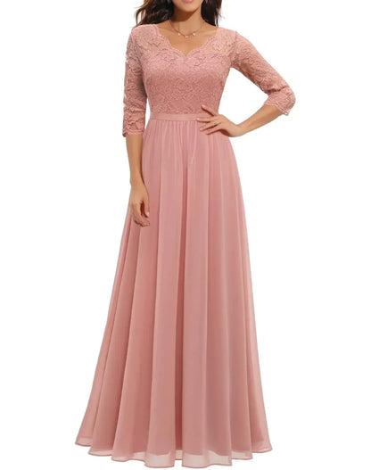 Pink Quarter Sleeve - Woman wearing a long A-line maxi dress featuring a lace bodice with 3/4 sleeves and a flowing pleated georgette skirt