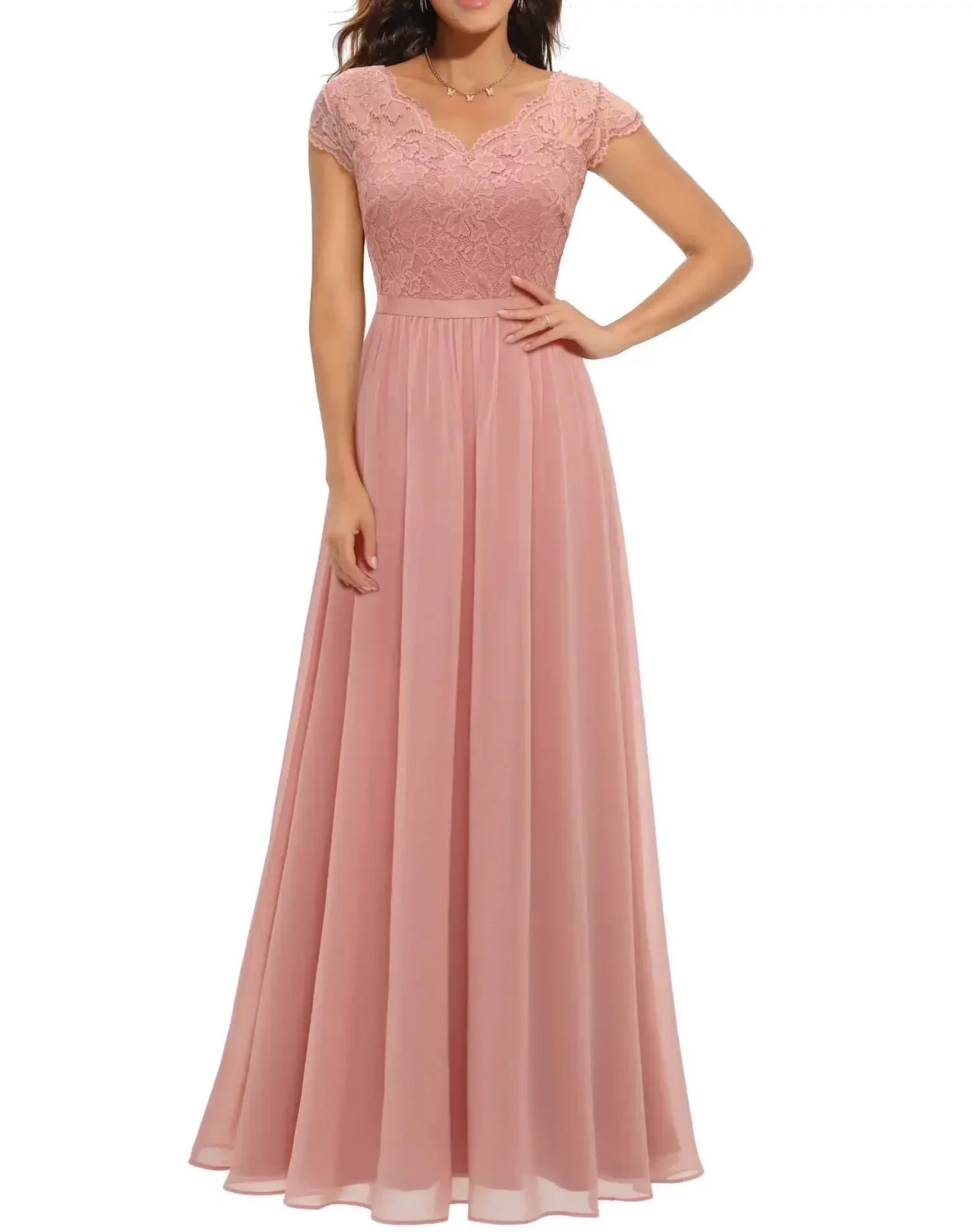 Pink Short Sleeve - Woman wearing a long A-line maxi dress featuring a lace bodice with 3/4 sleeves and a flowing pleated georgette skirt