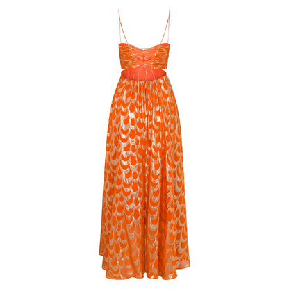 Women's bright orange maxi dress featuring a metallic gold scallop pattern, a ruched sweetheart bodice, side cut-outs, and a voluminous skirt.