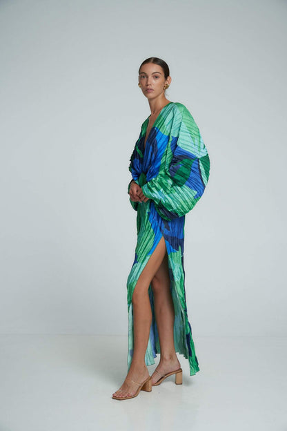 Green - Women's formal maxi dress featuring an all-over micro-pleated texture, bold green and blue abstract print, deep V-neckline, voluminous long sleeves, and a high side slit.