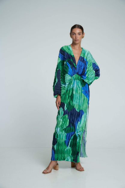 Green - Women's formal maxi dress featuring an all-over micro-pleated texture, bold green and blue abstract print, deep V-neckline, voluminous long sleeves, and a high side slit.