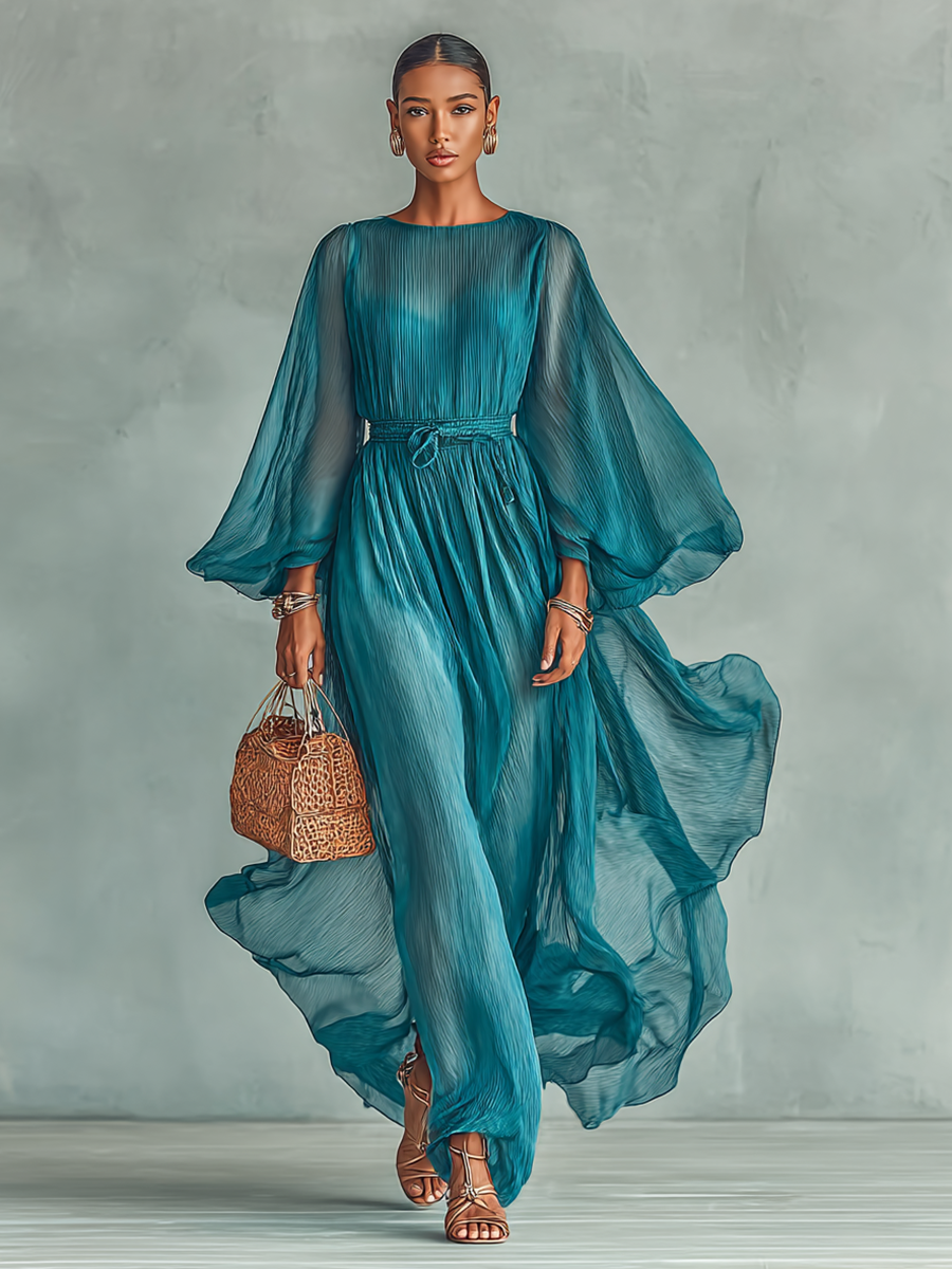 Blue - A model walks wearing a sheer black pleated chiffon maxi dress featuring long voluminous balloon sleeves, a high neckline, and a cinched tie-waist, showcasing a dramatic fluid drape.