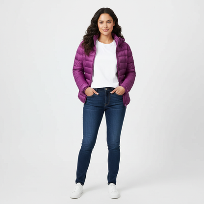 Purple - A woman wearing an off-white hooded puffer jacket with horizontal quilting, zipped up, paired with blue jeans against a plain white background.