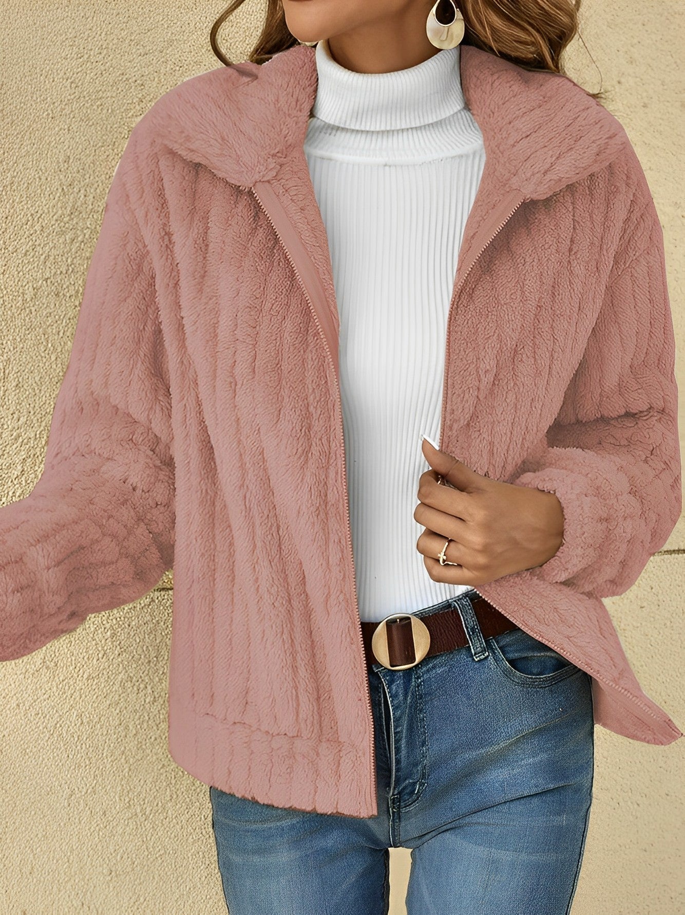 Pink - Women's plush faux fur jacket featuring a ribbed texture, zip-front closure, and a relaxed fit, styled over a white turtleneck.