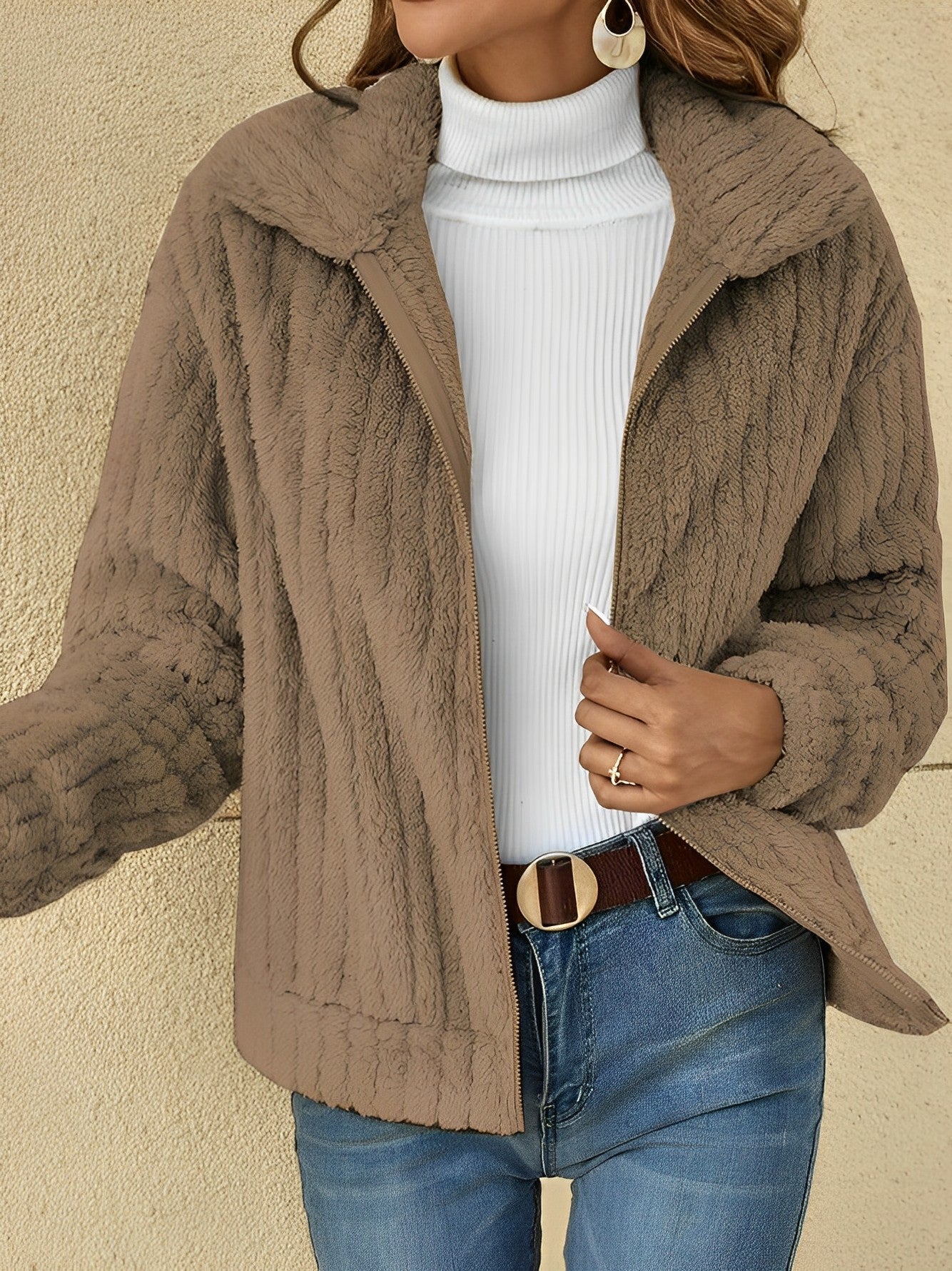 Brown - Women's plush faux fur jacket featuring a ribbed texture, zip-front closure, and a relaxed fit, styled over a white turtleneck.