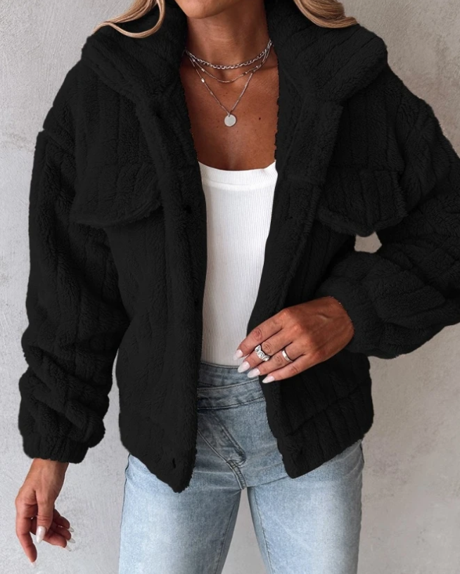 Black - Women's cream-coloured heavyweight ribbed teddy jacket featuring a collared neckline, snap-button front, and twin chest flap pockets, styled open over a white top and light wash jeans.