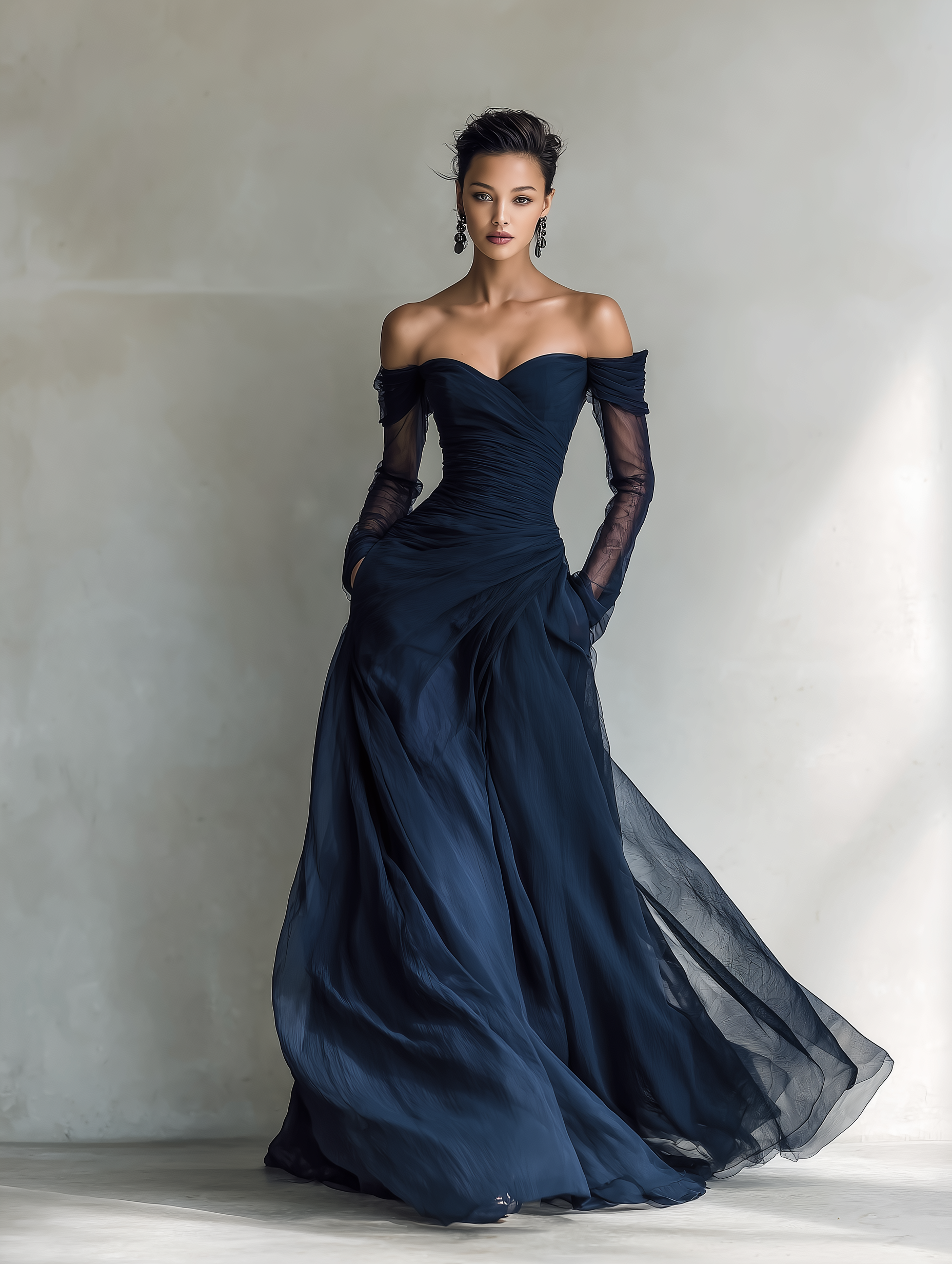 Dark Blue - A woman wearing a floor-length navy blue chiffon gown featuring an off-the-shoulder sweetheart neckline, sheer long sleeves, and a meticulously ruched bodice that drapes into a sweeping A-line skirt.