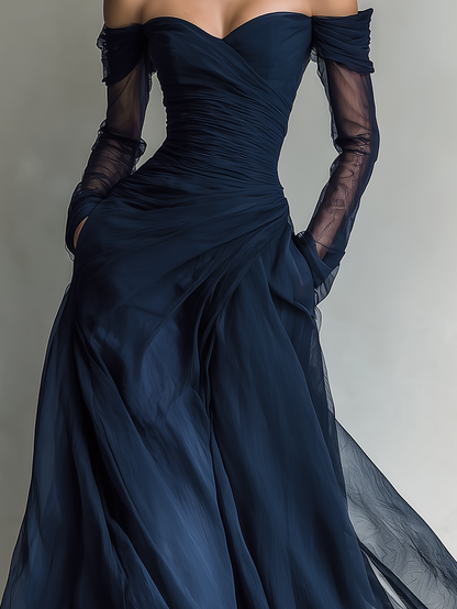 Dark Blue - A woman wearing a floor-length navy blue chiffon gown featuring an off-the-shoulder sweetheart neckline, sheer long sleeves, and a meticulously ruched bodice that drapes into a sweeping A-line skirt.