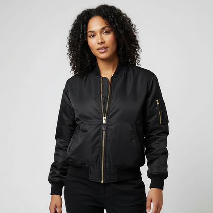 Black - A woman wearing a vibrant red satin-finish bomber jacket featuring a ribbed collar, zip-up front, and a utility pocket on the left sleeve, styled over a white t-shirt.