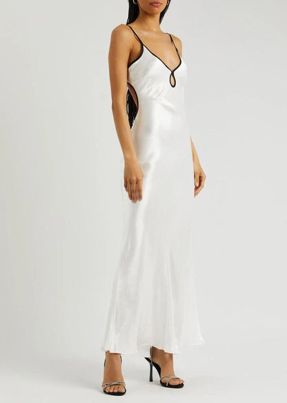 Women's formal white satin maxi slip dress featuring a V-neckline with a front keyhole cutout and thin black contrast piping along the straps and bust.