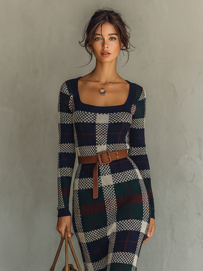 Navy - A woman wearing a long-sleeve, square-neck maxi knit dress featuring a classic navy, green, and white plaid pattern, styled with a brown leather belt at the waist.