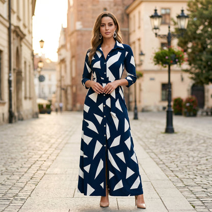 Black - A woman wearing a black and white vertically striped maxi shirt dress with a collar, three-quarter sleeves, and a self-tie belt at the waist, paired with black high-heeled sandals against a plain white background.
