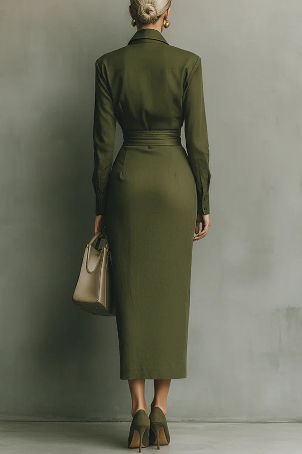 2XL - A woman wearing an elegant olive green textured midi dress with a pointed collar, long sleeves, a highly cinched ruched waist, and a draped wrap skirt with a side pocket.