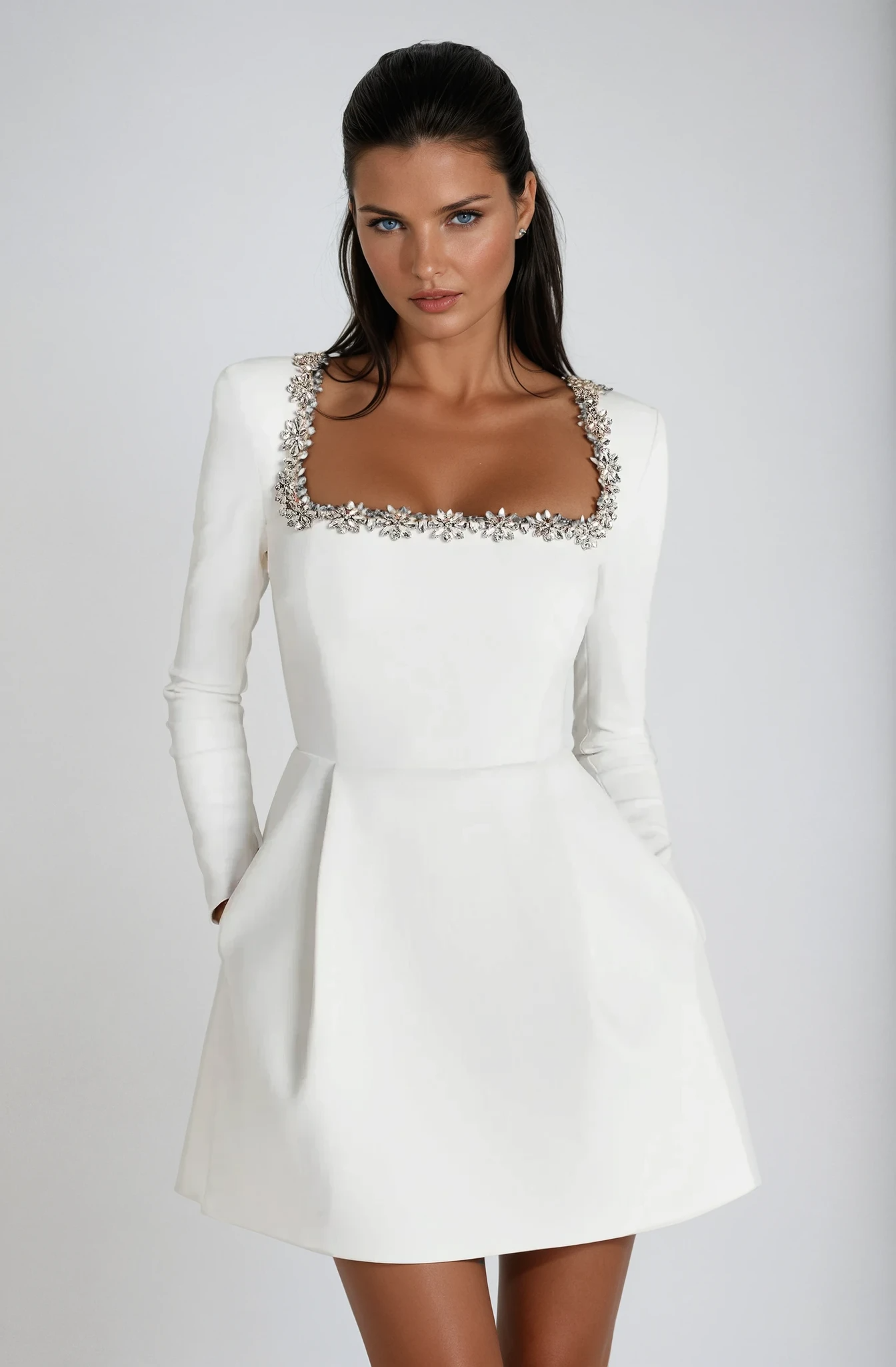 White - Women's heavyweight velvet long sleeve mini dress featuring a structured A-line skirt and intricate crystal floral embellishments.