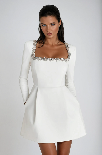 White - Women's heavyweight velvet long sleeve mini dress featuring a structured A-line skirt and intricate crystal floral embellishments.