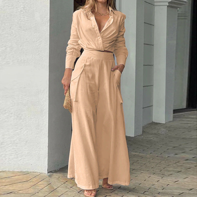 Light Orange - Women's beige two-piece set featuring a long-sleeve collared crop top and high-waisted wide-leg pants with large cargo pockets, worn outdoors.